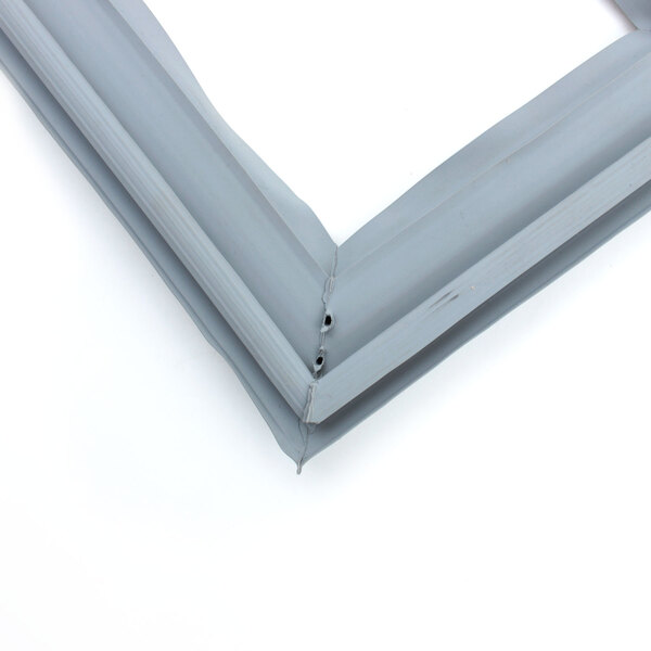 A grey Delfield drawer gasket with a metal frame and two holes.