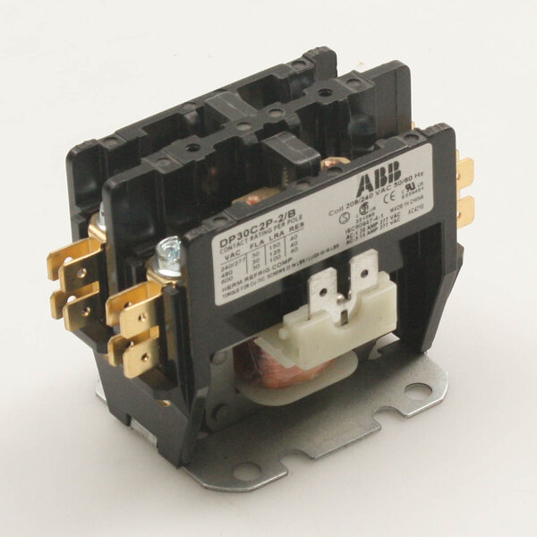 A black and gold SaniServ control relay with two wires.