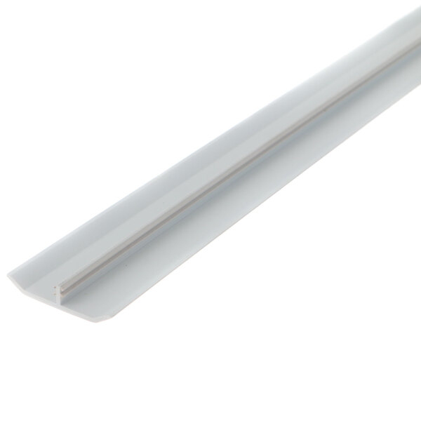 A white plastic strip with a silver strip on the end.