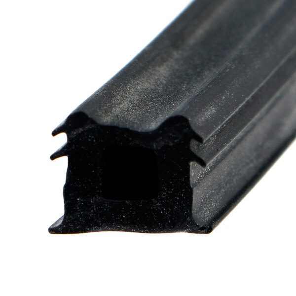 A close-up of a black rubber tube with a hole.