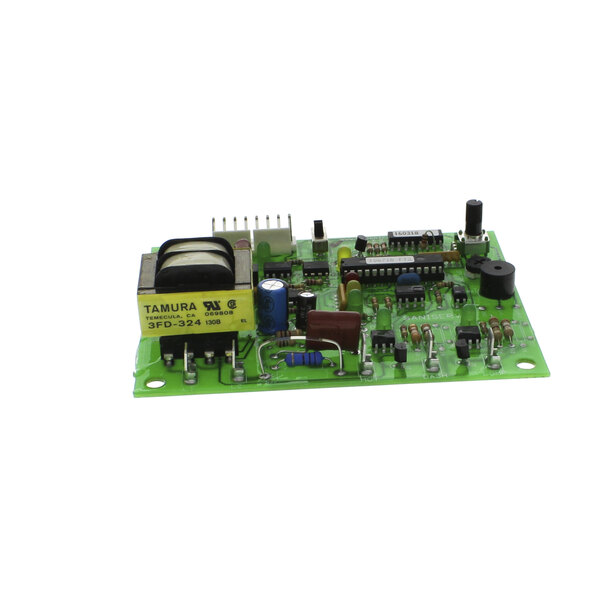A green circuit board with various components and a yellow and black label with black text.