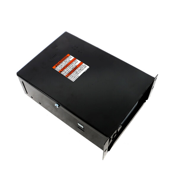 A black rectangular box with an orange label.