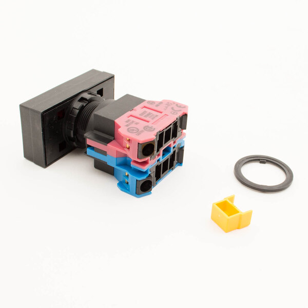 The Univex Start/Stop Switch, a small plastic device with yellow and pink connectors.
