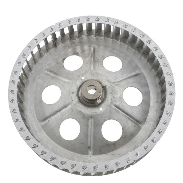 A circular metal Blodgett blower wheel with holes in it.