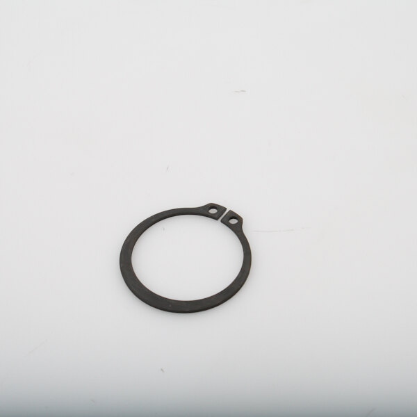 A small black metal retaining ring with holes on a white surface.