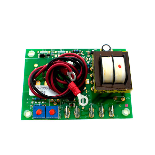 A green circuit board with wires and a white cover.