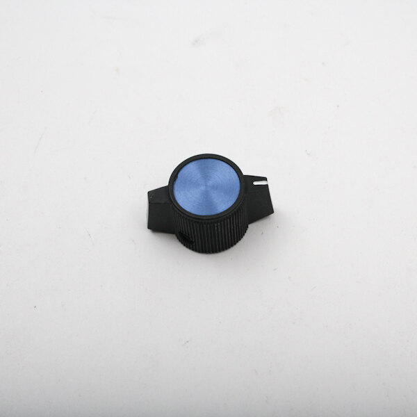 A blue and black knob with a blue circle.