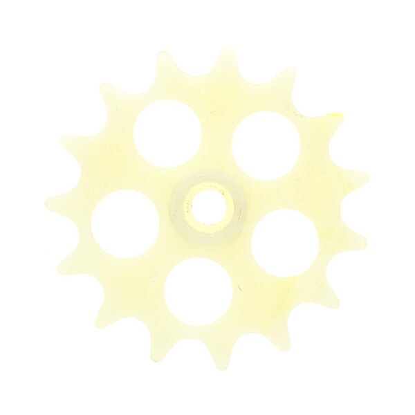 A close-up of a white nylon gear with a hole in the center.