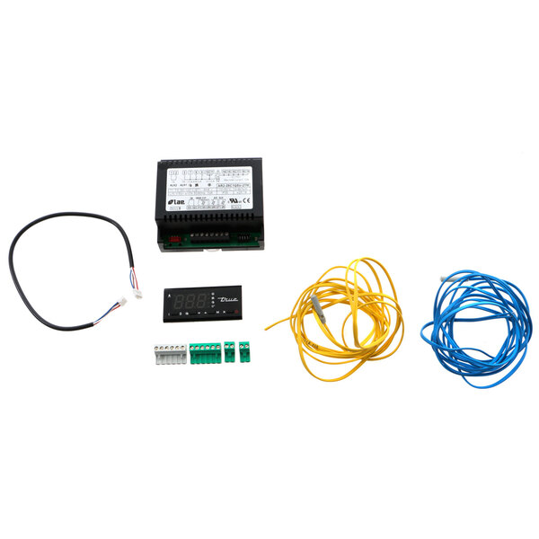 A True Refrigeration control board kit with a black electronic device with wires and a digital display.