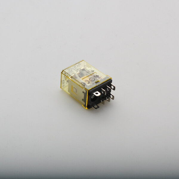 A close up of a small yellow and black Salvajor reversing relay with a clear plastic cover.