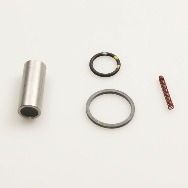 An American Metal Ware Alco repair part with a metal cylinder, spring, and rubber seal.