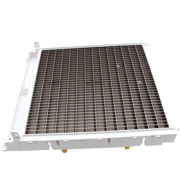 A white metal grid for a Manitowoc Ice half dice evaporator.