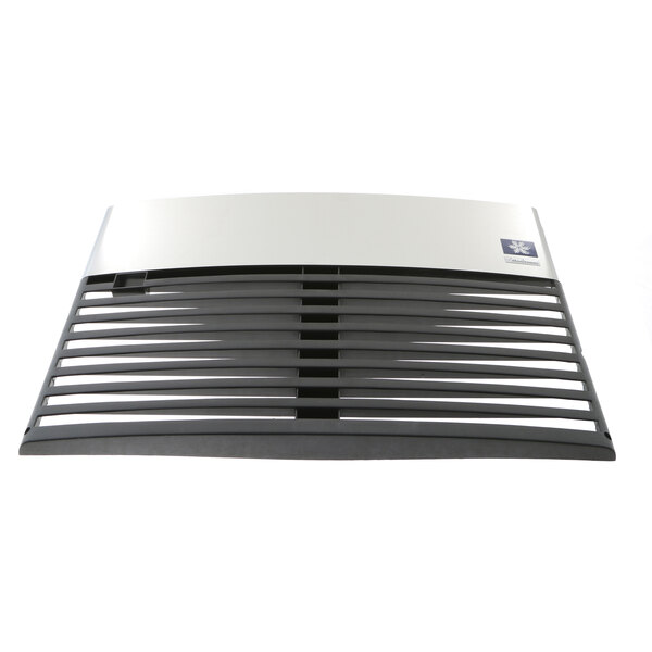 A white and black Manitowoc Ice front panel vent.