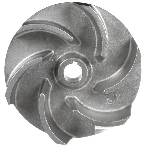 A round metal impeller with a hole in the center.