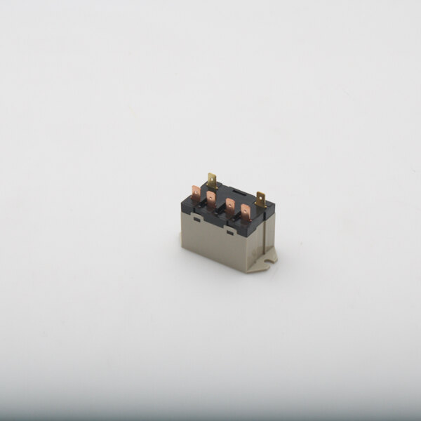 A True Refrigeration temp control relay, a small square device with several small metal parts, two wires, and a small button.