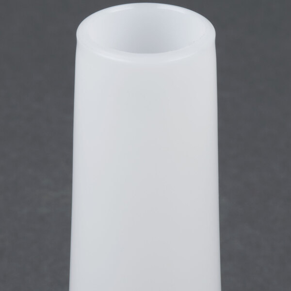 An Avantco white cylindrical sausage stuffer tube with a black handle on a gray surface.