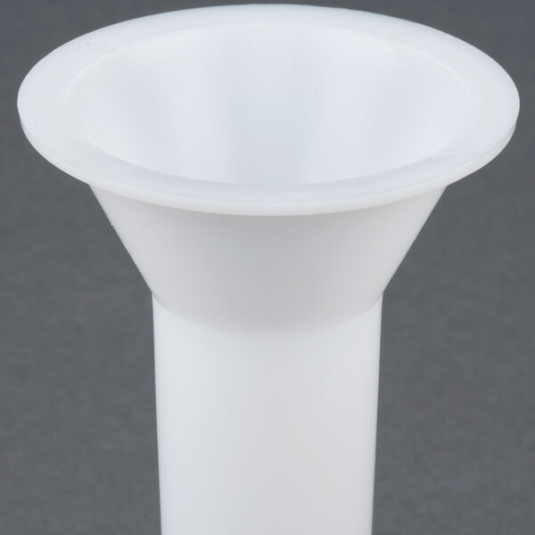 A white plastic sausage stuffer funnel.