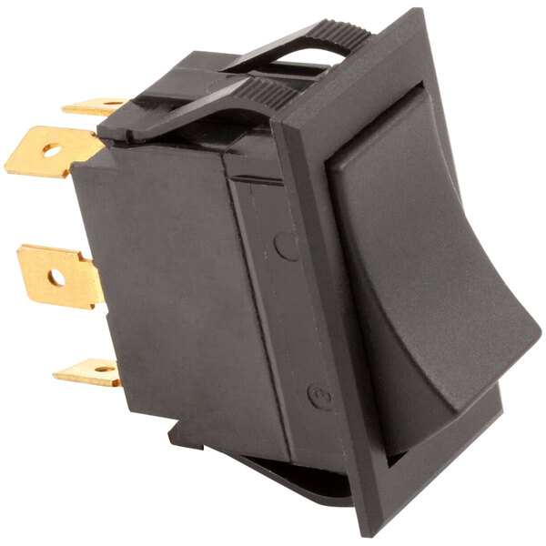 A black Stero rocker switch with two gold pins.