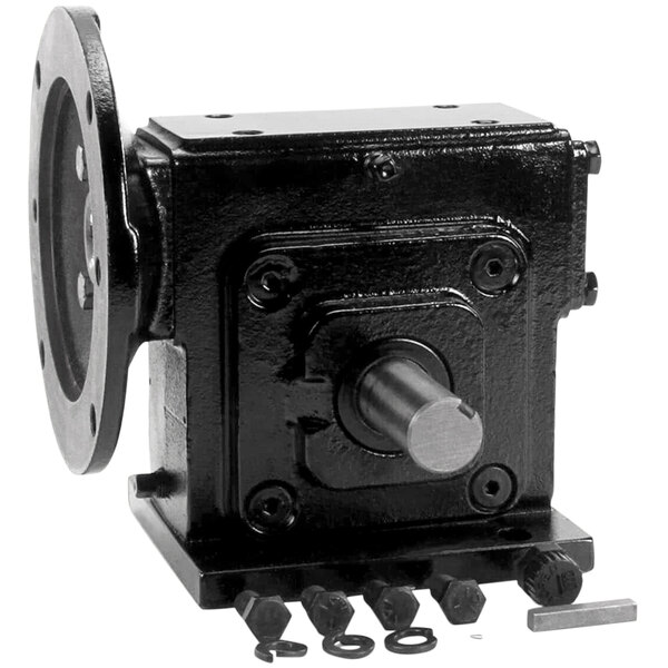 A black metal Stero gear box with a round disc inside.