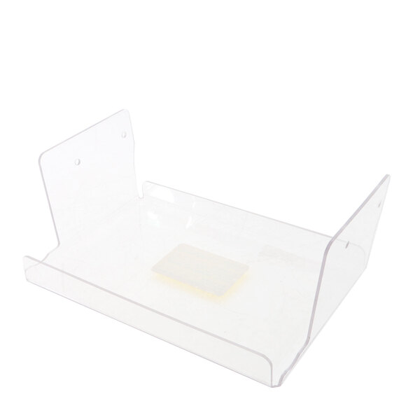 A clear plastic protector with yellow edges on a piece of paper.