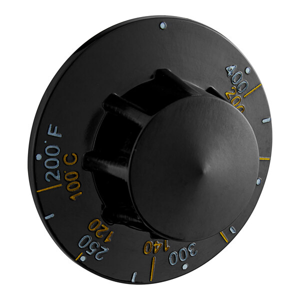 A black Pitco knob with yellow writing and numbers.
