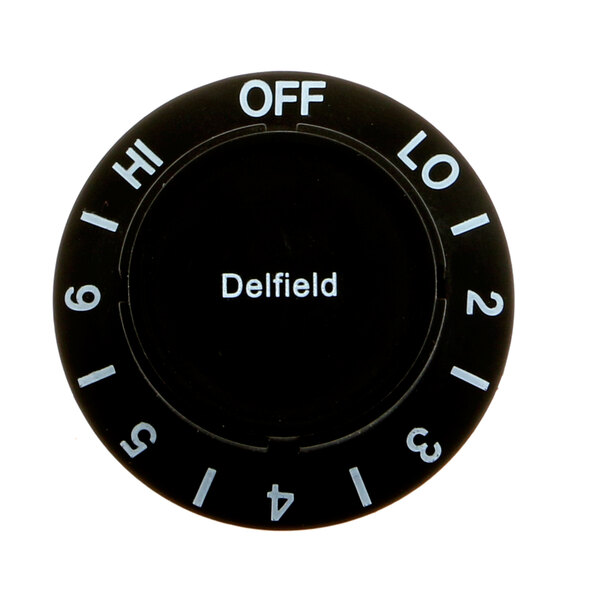 A black Delfield control knob with white text.