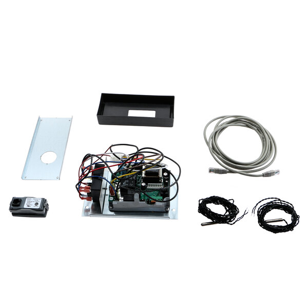 A Delfield retrofit kit for a commercial freezer control board with wires and cables.
