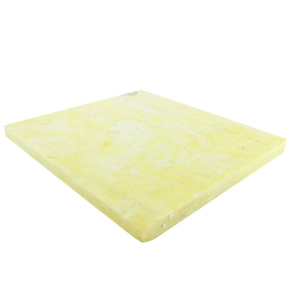 A yellow foam board with white spots.