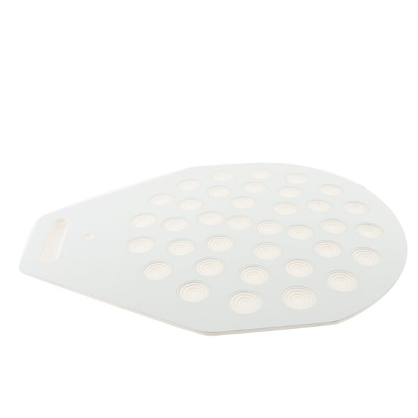 A white mat with circles on it.