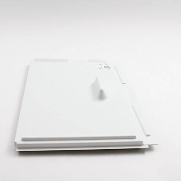 A white plastic rectangular tray with a small hole in it.