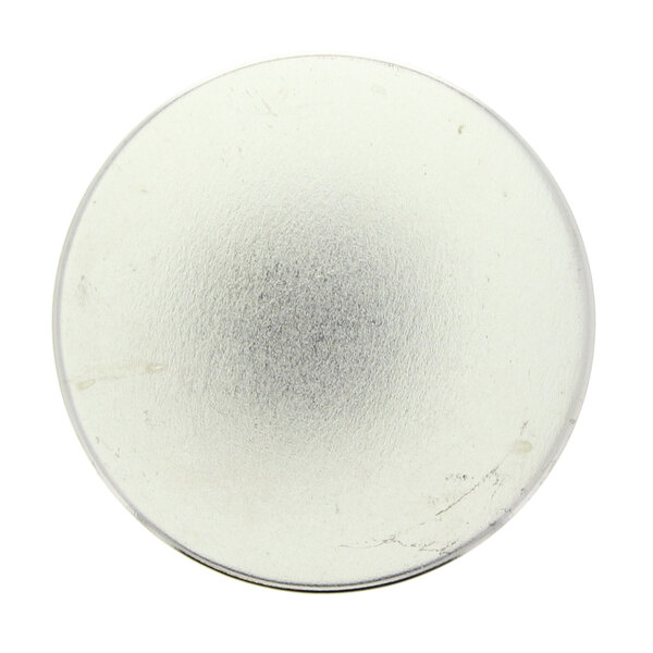 A close-up of a white circular Stero plug.