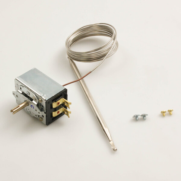 A small metal device with a wire and screws, and a metal rod.