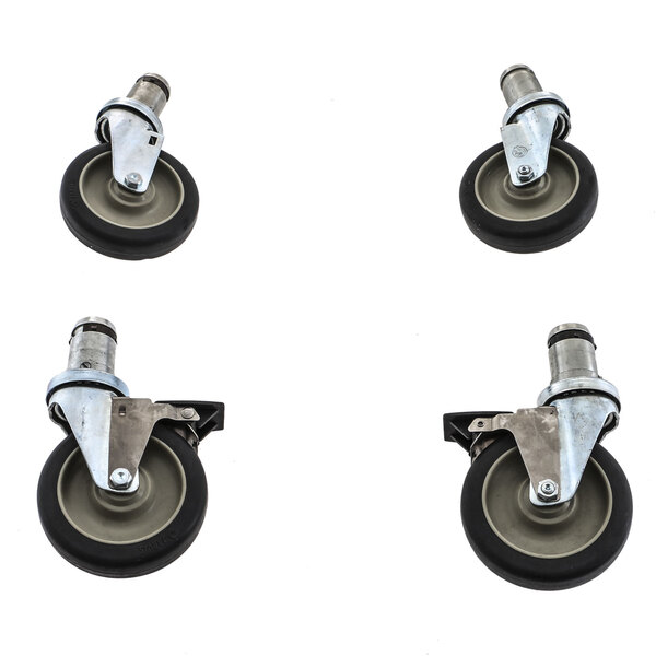 A Blodgett caster kit with four black and silver casters with rubber wheels.