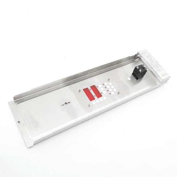 A metal rectangular panel with red and white buttons.