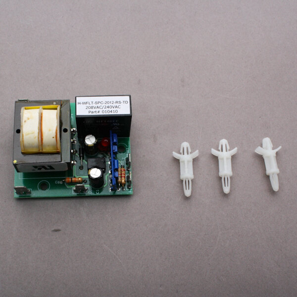 A Groen low water cut relay with plastic dowels and two wires.