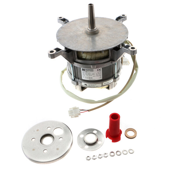 A Rational 3100.1060 motor, a small round metal device with wires and other parts.