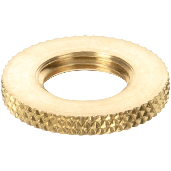 A gold metal nut with a hole and gold plated threads.