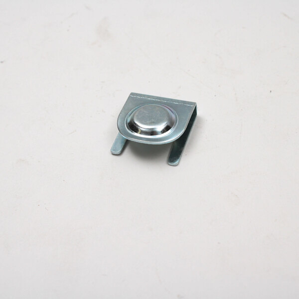 A Master-Bilt hinge pin retainer for a door with round metal pieces.