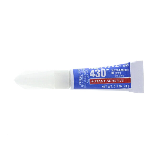 A tube of Blodgett adhesive with a white cap.
