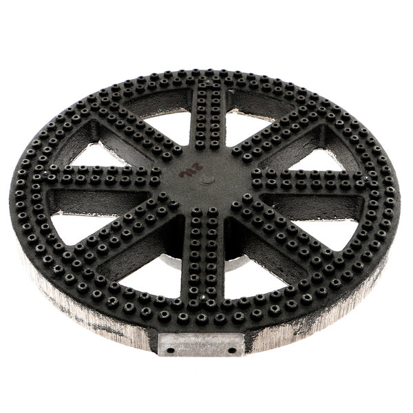 A black circular Groen burner head with holes.