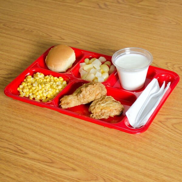 A red Carlisle compartment tray with chicken, corn, and a bun on it.
