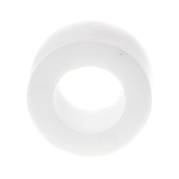 A white plastic circle with a hole in the middle.