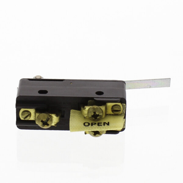 A black Cleveland Microswitch with a yellow label.