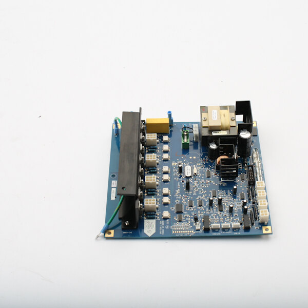 A Prince Castle Pc Board Kit with a blue circuit board and small components.