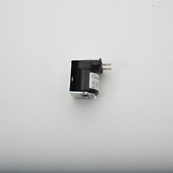 A Blodgett R5075 solenoid coil on a white surface.