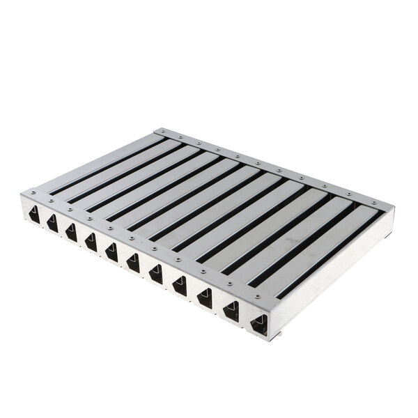 A metal tray with rows of holes.