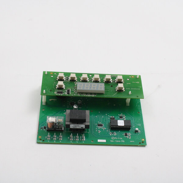A Blodgett 33801 control kit circuit board with white buttons and a digital display.