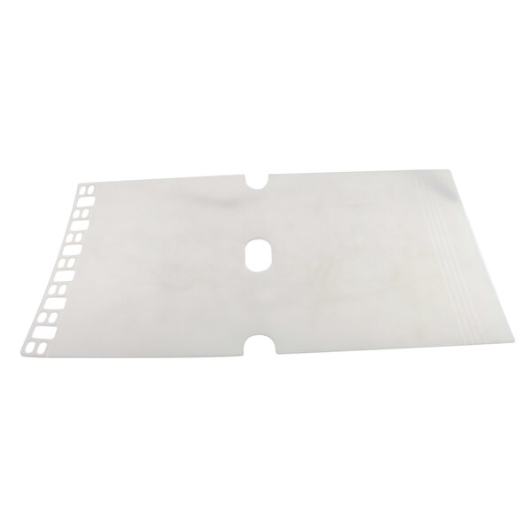 A white rectangular plastic sink liner with holes.