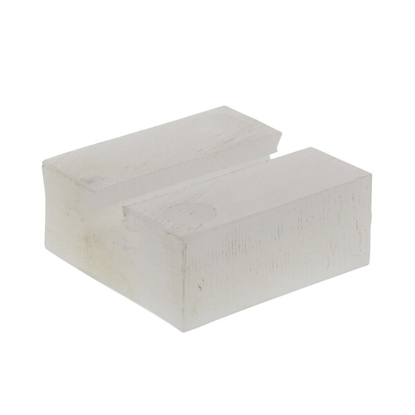 A white block of wood with a white background.