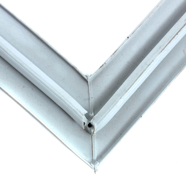 A close-up of a white metal corner.